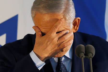 Israeli Prime Minister Benjamin Netanyahu gestures as he eulogises former Defense Minister Moshe Arens during his funeral in Tel Aviv, Israel January 8, 2019. REUTERS/Ronen Zvulun