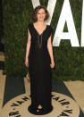 Emily Watson was all smiles upon arriving at the annual VF party in a black frock, curly 'do, and layered necklaces.