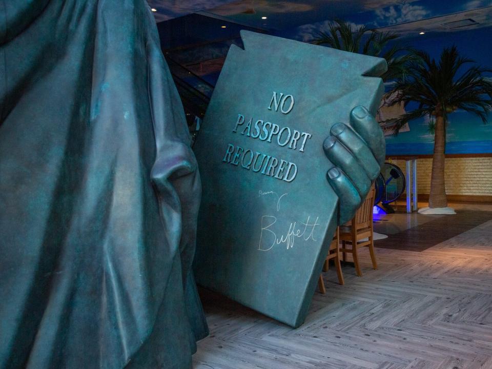 a close up of the statue of liberty signed by Jimmy Buffet