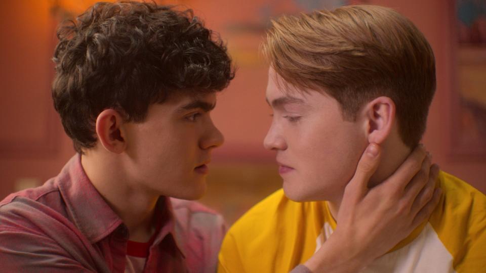 Joe Locke as Charlie and Kit Connor as Nick about to kiss in Heartstopper Season 2.