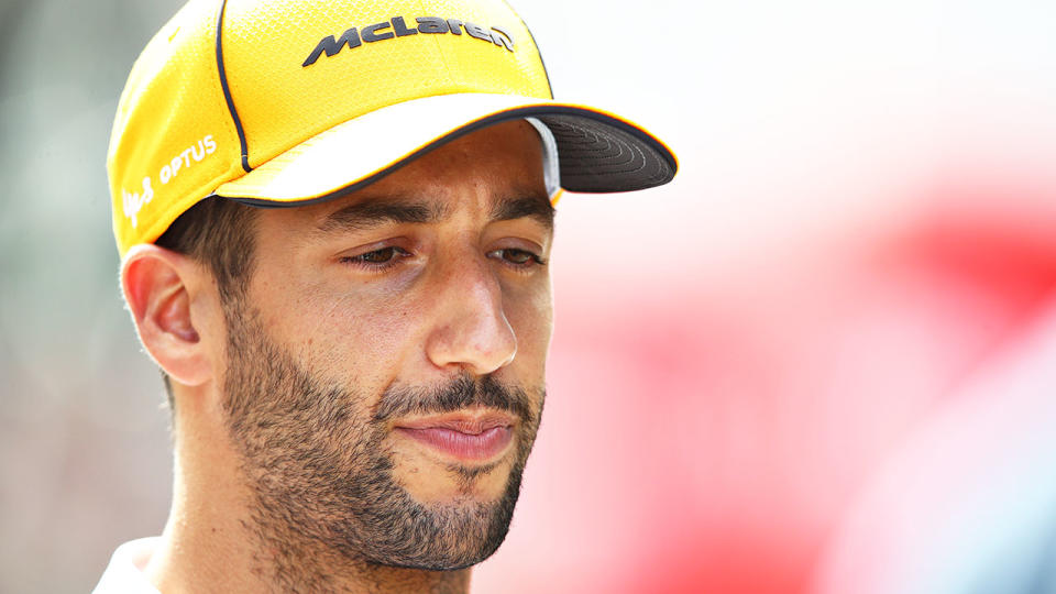 Pictured here, Daniel Ricciardo speaks with the media before a grand prix race in 2021.