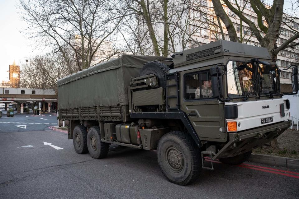 A military lorry is seen delivering a consignment of medical masks to St Thomas' hospital, London (Getty Images)
