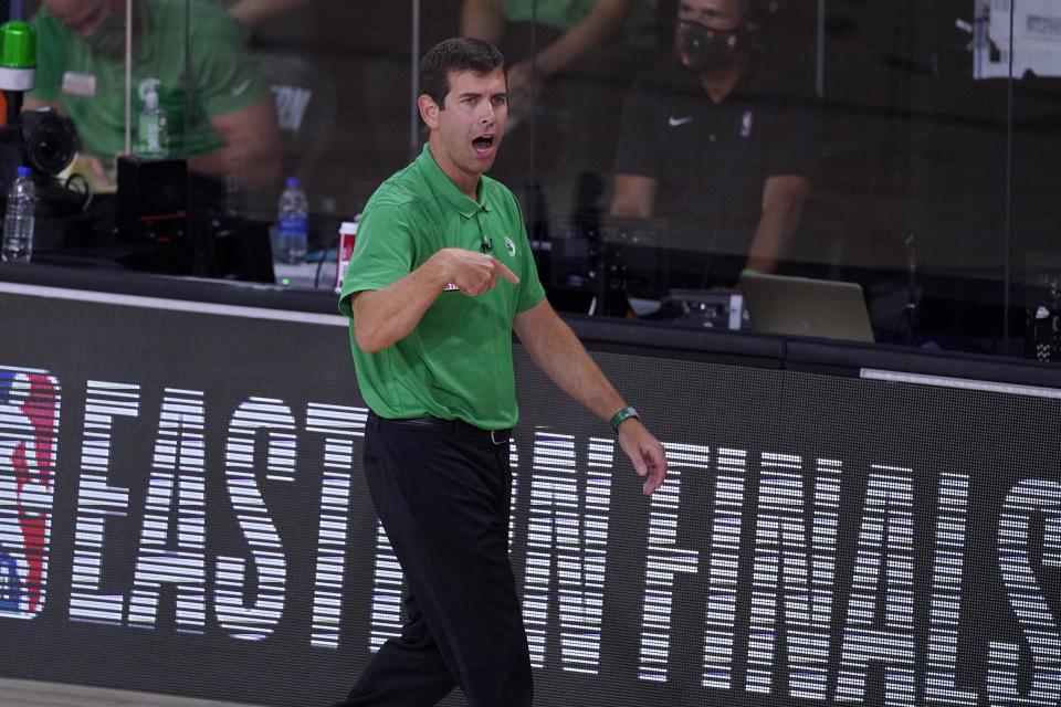 Boston Celtics head coach Brad Stevens instructs his team during the second half of an NBA conference final playoff basketball game against the Miami Heat on Thursday, Sept. 17, 2020, in Lake Buena Vista, Fla. (AP Photo/Mark J. Terrill)