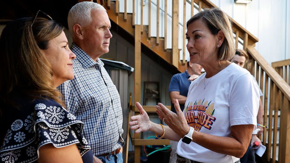 Former Vice President Mike Pence and his wife, Karen, visit with Reynolds before participating in the "fair-side chat" at the Iowa State Fair on August 11, 2023. - Chip Somodevilla/Getty Images