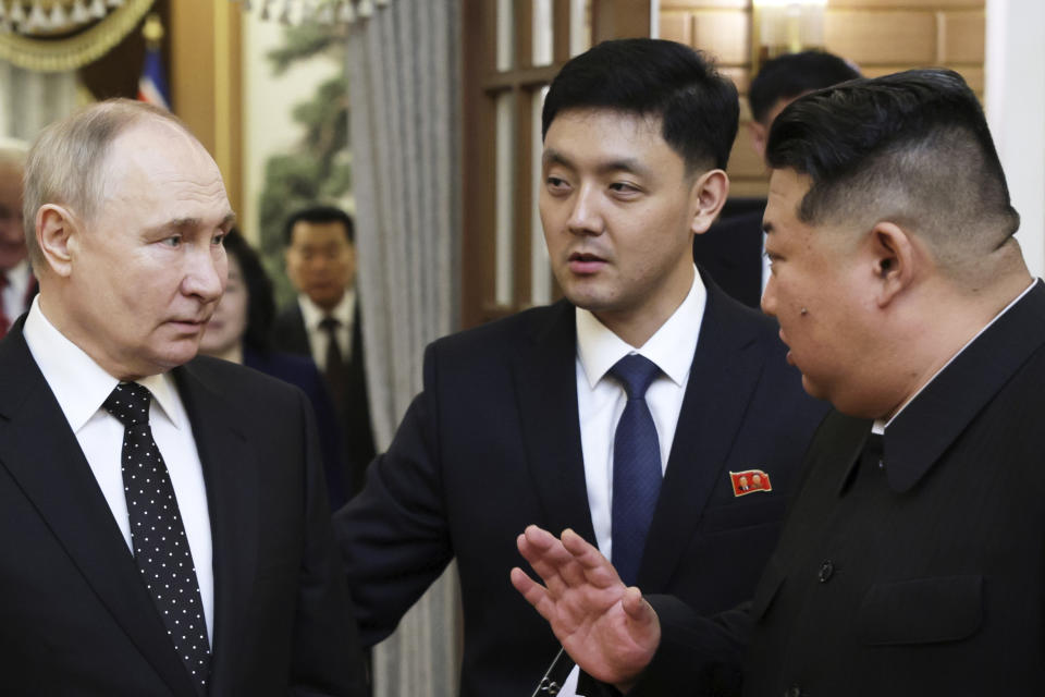 Russian President Vladimir Putin, left, listens to North Korea's leader Kim Jong Un during their meeting in Pyongyang, North Korea, on Wednesday, June 19, 2024. (Gavriil Grigorov, Sputnik, Kremlin Pool Photo via AP)