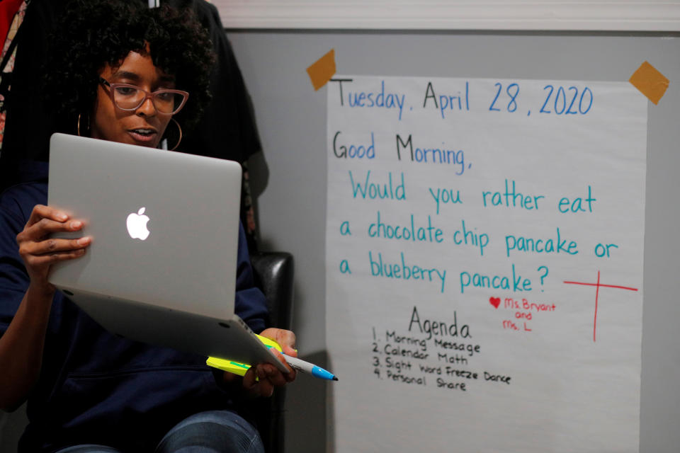 Boston Public School teacher Princess Bryant teaches her kindergarten class via video-conference from her apartment after schools were closed for the remainder of the school year because of the coronavirus disease (COVID-19) outbreak in Boston, Massachusetts, U.S., April 28, 2020. REUTERS/Brian Snyder     TPX IMAGES OF THE DAY