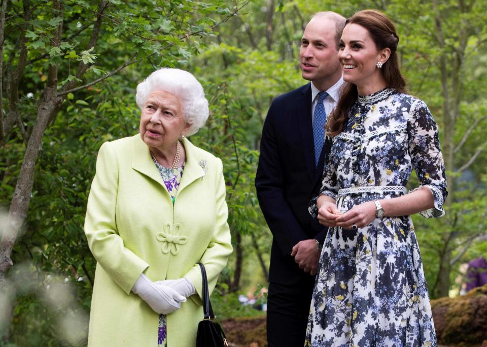 Prince William and his wife Catherine, the new Prince and Princess of Wales, formerly the Duke and Duchess of Cambridge, with the late Queen Elizabeth II on May 20, 2019 , at the 2019 RHS Chelsea Flower Show in London.