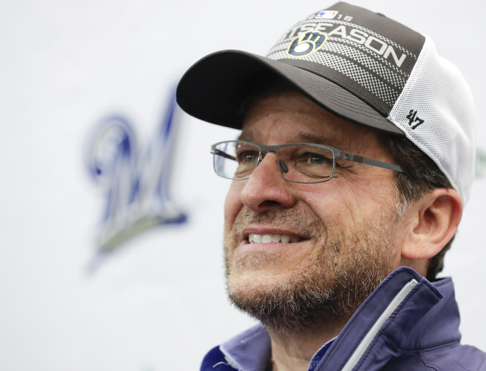 FILE - Milwaukee Brewers owner Mark Attanasio answers questions during a news conference before a baseball game between the Brewers and the Detroit Tigers, Sept. 28, 2018, in Milwaukee. Brewers principal owner Attanasio expressed optimism about the status of negotiations involving renovations to American Family Field and indicated he wants to make sure the team stays in Milwaukee. (AP Photo/Morry Gash, File)