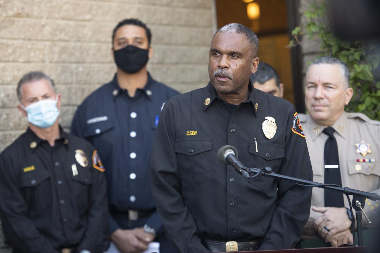 Los Angeles County Fire Department Chief Daryl L. Osby speaks during a press conference in front of Sheriff Department building in Lomita, Calif., Tuesday, Feb. 23, 2021, regarding golfer Tiger Woods' car accident.