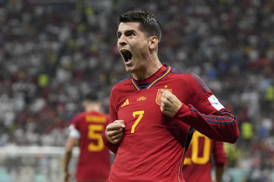 Spain's Alvaro Morata celebrates after scoring the opening goal during the World Cup group E soccer match between Spain and Germany, at the Al Bayt Stadium in Al Khor , Qatar, Sunday, Nov. 27, 2022. (AP Photo/Matthias Schrader)