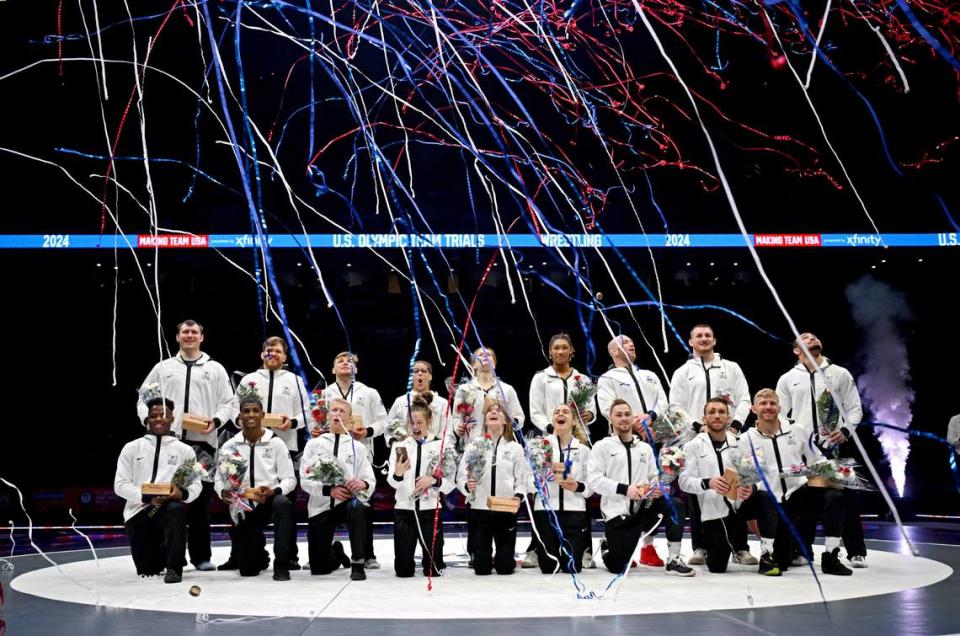 Confetti covers the winners from the U.S. Olympic Team Trials for wrestling at the Bryce Jordan Center on Saturday, April 20, 2024.