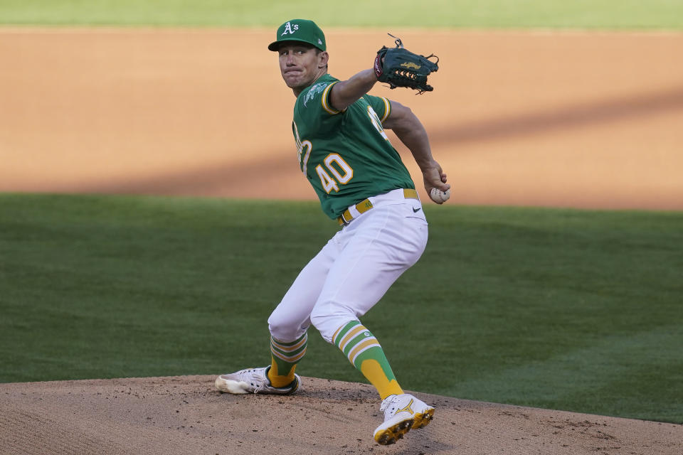 Oakland Athletics' Chris Bassitt pitches to a Los Angeles Angels batter during the first inning of a baseball game in Oakland, Calif., Thursday, May 27, 2021. (AP Photo/Jeff Chiu)