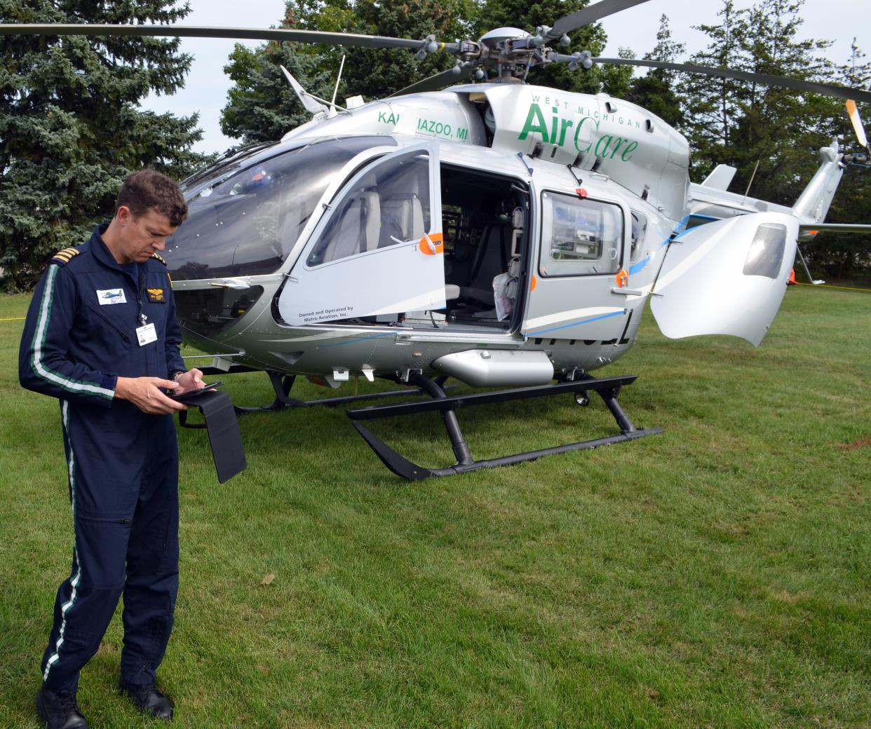 A Metro Aviation pilot checks flight information in 2016.