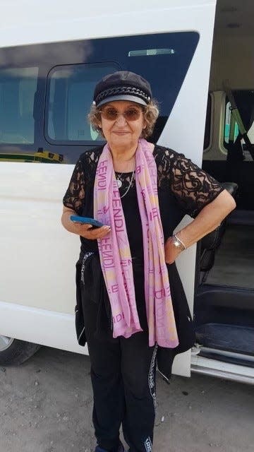 Naela Elshorafa of Camarillo poses for a photo in Egypt after crossing the border from Gaza. She had been trapped in the region for weeks after coming to visit her sick mother.