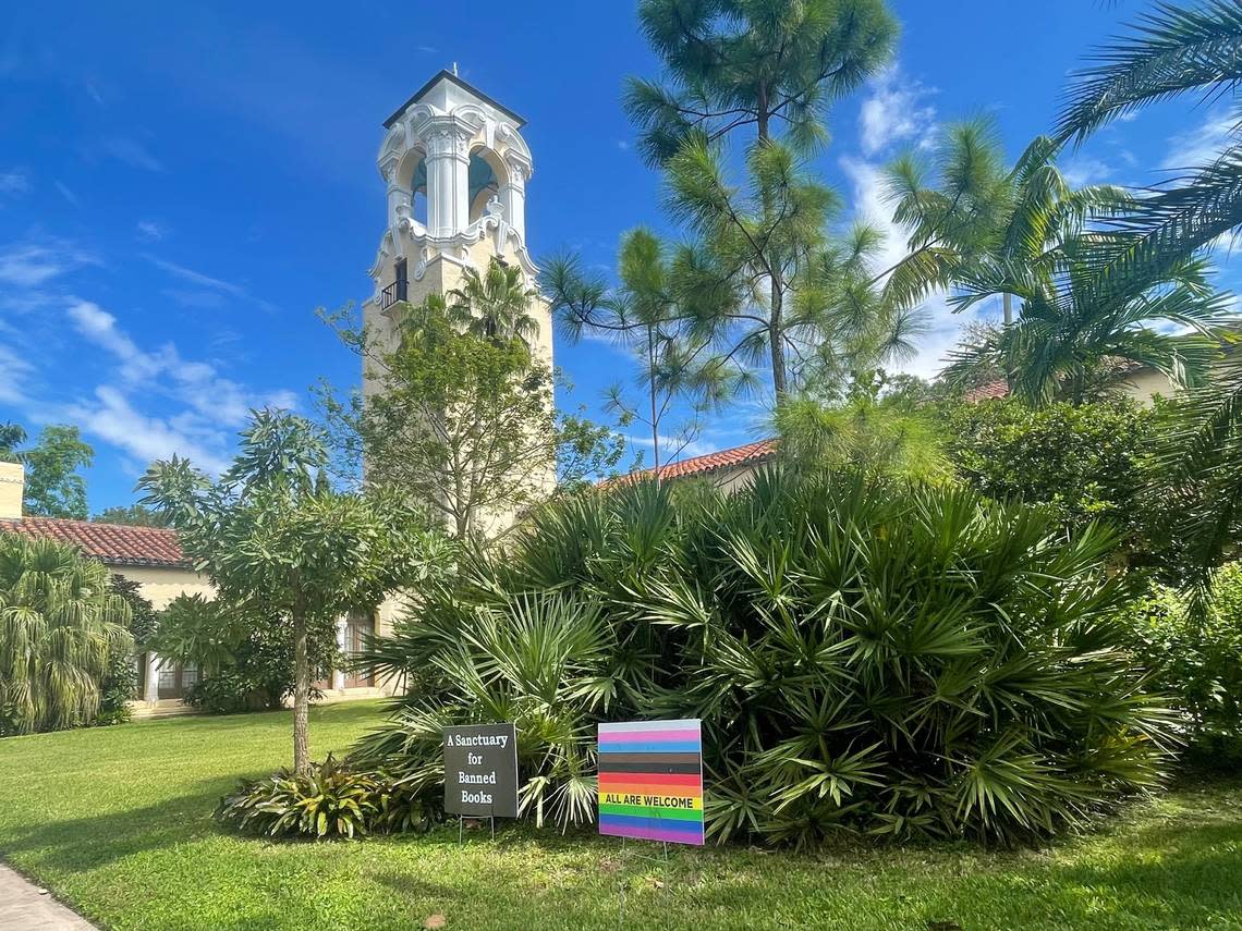 Signs outside the Coral Gables Congregational United Church of Christ say “A Sanctuary for Banned Books” and “All Are Welcome” during the “Walk for Freadom” kickoff event on Sunday, October 1, 2023 in Coral Gables, Florida. The march began at the Coral Gables Congregational United Church of Christ and ended at Books & Books.