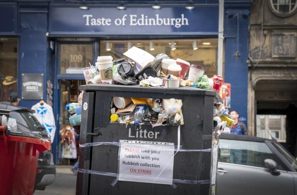 Bins and litter along the Canongate in Edinburgh city centre (Jane Barlow/PA) (PA Wire)