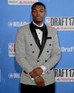 <p>North Carolina State’s Dennis Smith poses for photos while walking the red carpet before the start of the NBA basketball draft, Thursday, June 22, 2017, in New York. (AP Photo/Frank Franklin II) </p>