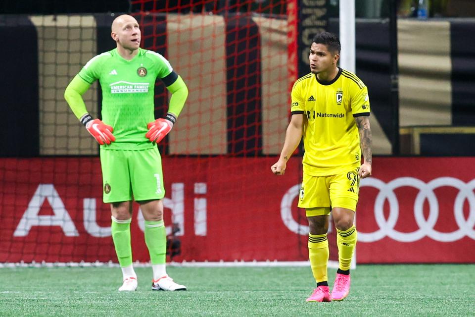 Nov 7, 2023; Atlanta, Georgia, USA; Columbus Crew 
Cucho Hernández (9) reacts while Atlanta United goalkeeper Brad Guzan (1) watches after scoring a goal in the first half at Mercedes-Benz Stadium. Mandatory Credit: Brett Davis-USA TODAY Sports