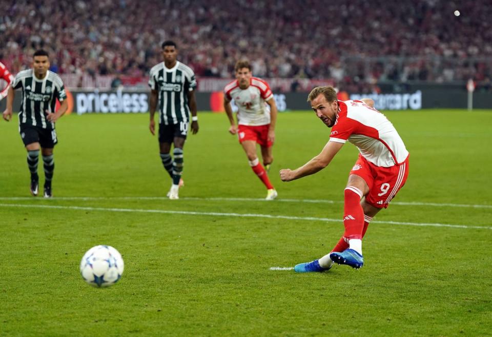 Kane slotted home a penalty kick after setting up Bayern’s first goal (PA)