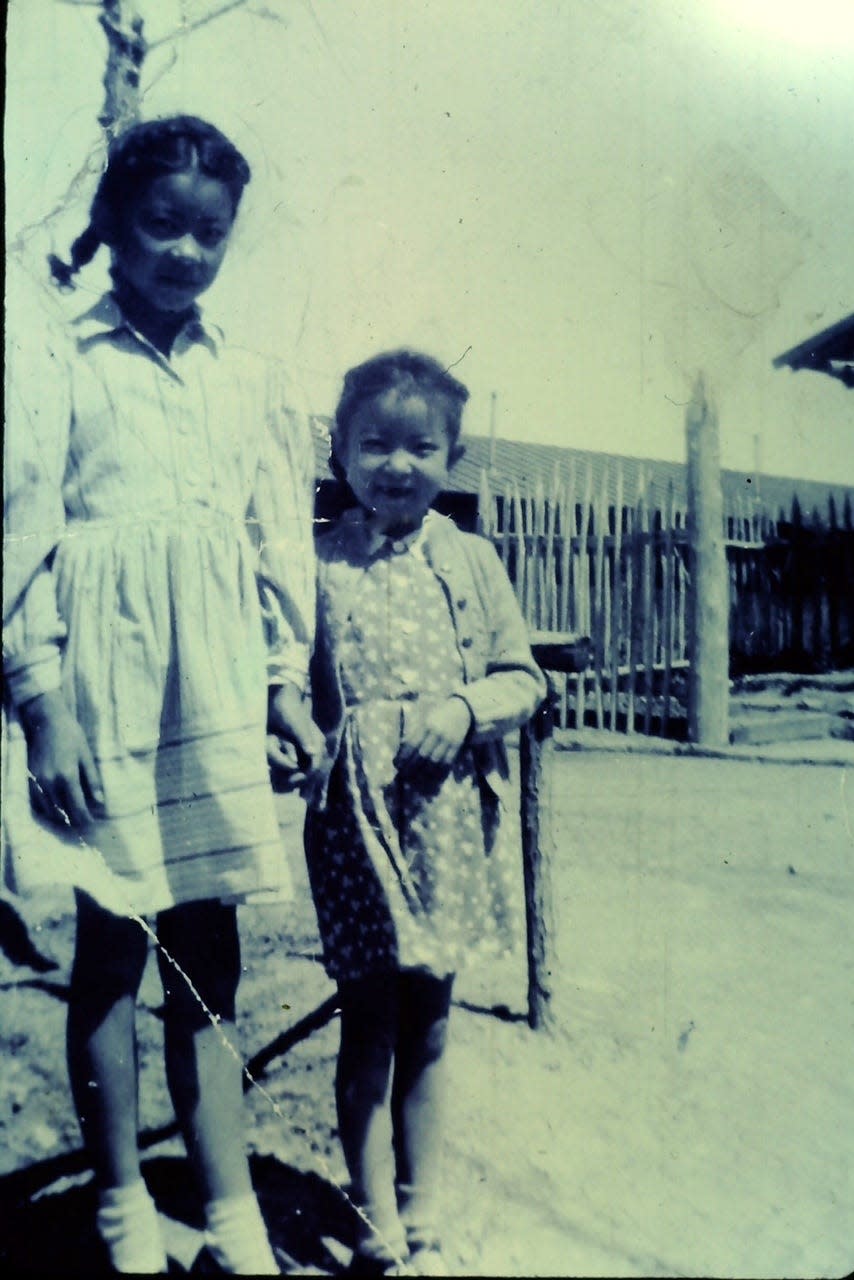 Nancy Bellin and her older sister at the internment camp where they were sent in 1942