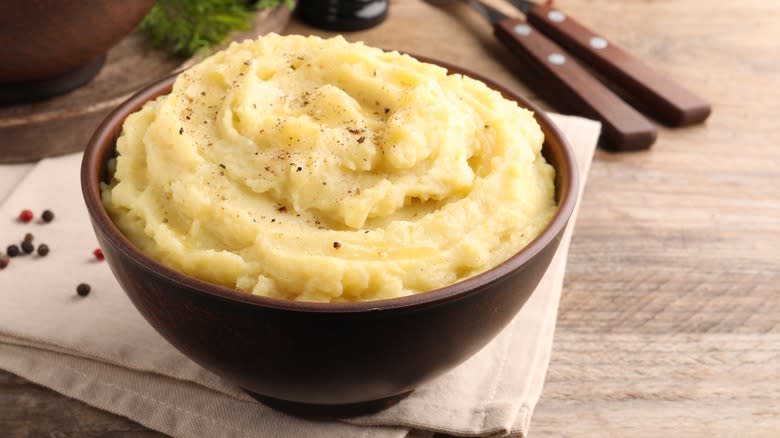mashed potatoes in brown bowl