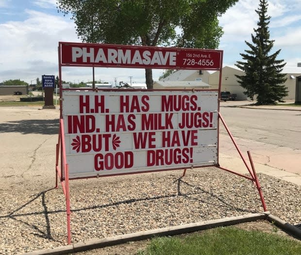 The Pharmasave in Melville, Sask., is among the businesses participating in a good-natured 'sign war,' along with Home Hardware and the local Independent grocery store. (Submitted by Kim Haas - image credit)