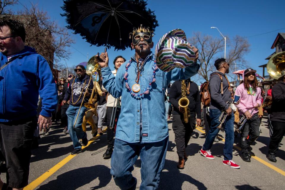 Scenes from the Marche du Nain Rouge, a parade made up of Detroiters, on Second Avenue on Sunday March 20, 2022.  