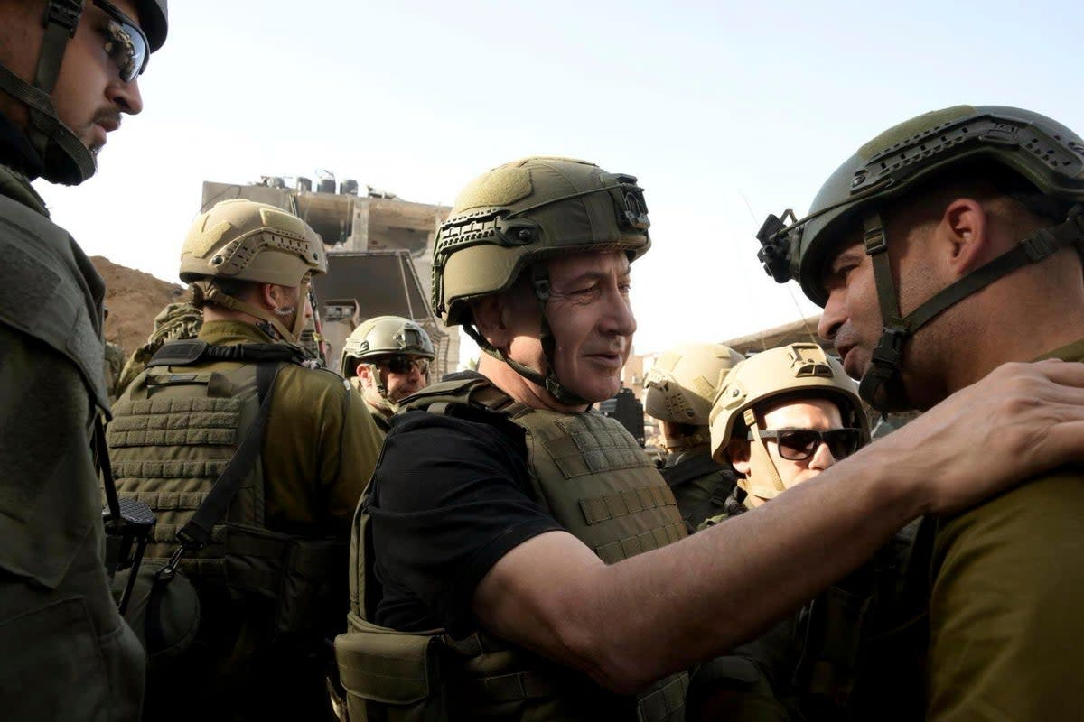 Benjamin Netanyahu with Israeli forces during a trip into Gaza  (Via AP)