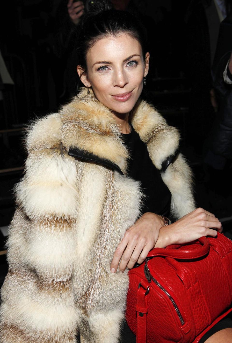 Liberty Ross is seen at the Fall 2013 Alexander Wang Runway Show, on Saturday, Feb. 9, 2013 in New York. Ross says she's lying low in the wake of her very public split from husband, director Rupert Sanders. Ross filed for divorce in January, five months after news broke that Sanders had an affair with Kristen Stewart. Sanders directed both Stewart and Ross in "Snow White and the Huntsman." Ross also walked the runway for the Alexander Wang Spring 2013 collection on Sept. 8, 2012. (Photo by Amy Sussman/Invision/AP)
