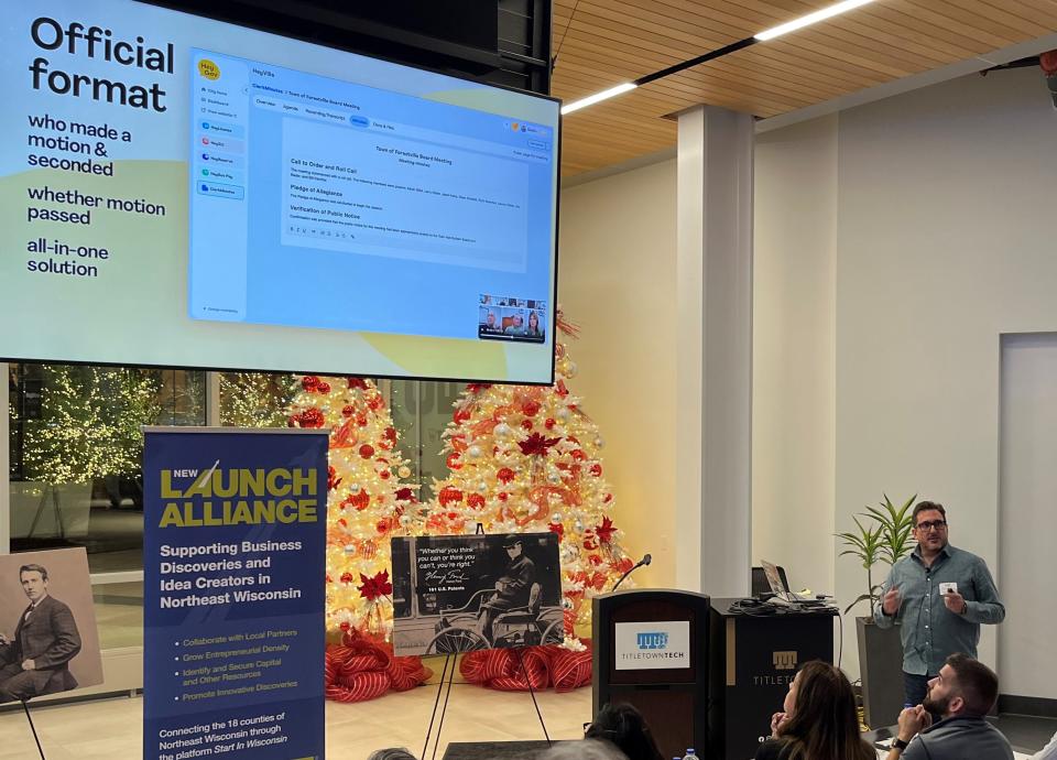 Dustin Overbeck, right, presents his new ClerkMinutes municipal software product during the Nov. 30 NEW Launch Alliance Pitch Event at Titletown Tech in Green Bay. Overbeck won the Nov. 15 Lighthouse Launch pitch contest for Door and Kewaunee County entrepreneurs to advance to the NEW event.