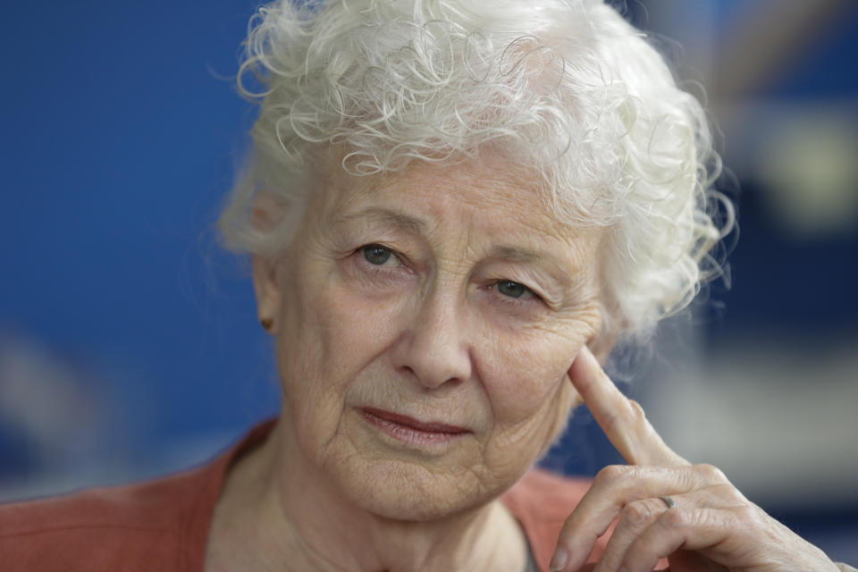 Anne Montgomery, mother of Democratic presidential candidate South Bend Mayor Pete Buttigieg, listens to a question during an interview in his campaign office in South Bend, Ind., Wednesday, Sept. 25, 2019. (AP Photo/Michael Conroy)