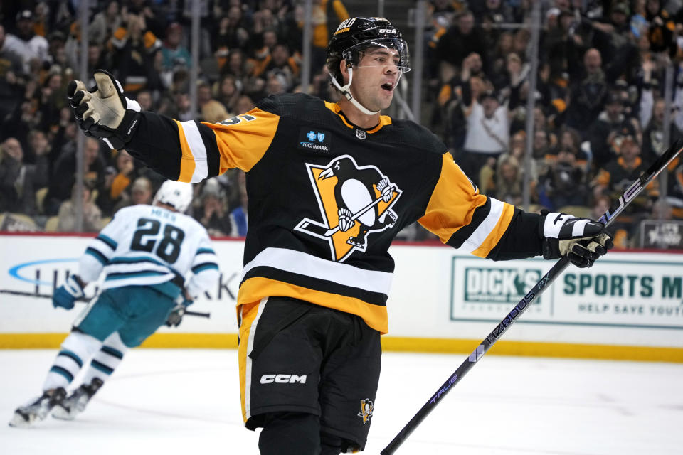 Pittsburgh Penguins' Ryan Poehling (25) celebrates his goal during the second period of an NHL hockey game against the San Jose Sharks in Pittsburgh, Saturday, Jan. 28, 2023. (AP Photo/Gene J. Puskar)