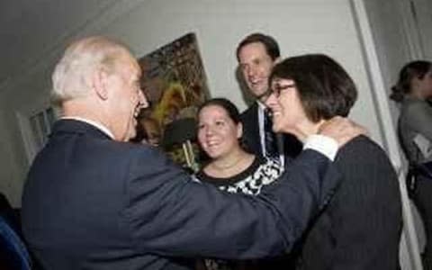Amy Lappos, central in black and white top, and Joe Biden, left, at an event in October 2009 - Credit: Courtesy of Amy Lappos