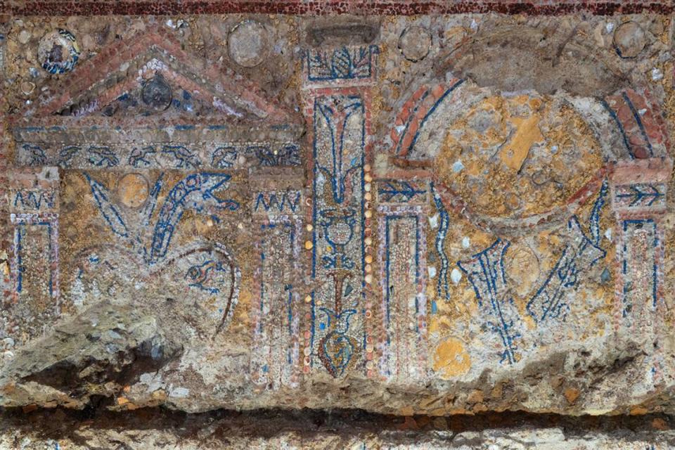 A close-up photo showing two of the shrines depicted in the mosaic.