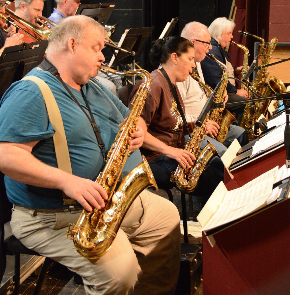 From left, TCA Big Band saxophonists Eric Korte, MaryBeth Madziar, Terry Hunt and Karen Bunch lay down a sax lick. Missing from the photo is Lynne Smith, who was taking pictures.