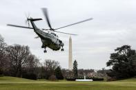 WASHINGTON, DC - DECEMBER 16: (AFP OUT) U.S. President Barack Obama aboard Marine One departs the White House to travel to Connecticut December 16, 2012 in Washington, DC. President Obama will meet with the families of victims of the shooting at Sandy Hook Elementary School in Newtown. (Photo by Brendan Hoffman-Pool/Getty Images)