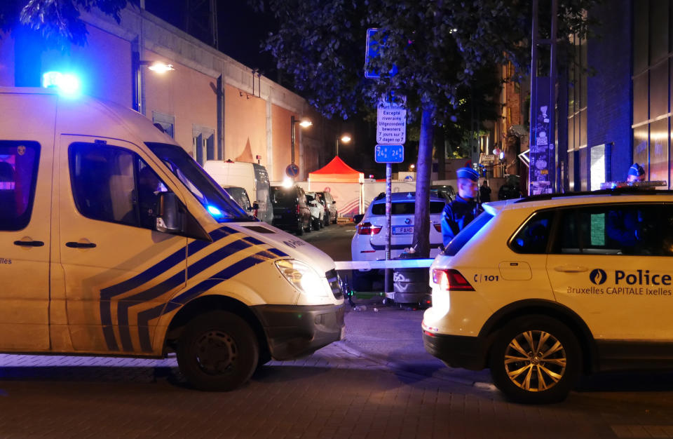 Police attend the scene of an incident in Brussels, Thursday Nov. 10, 2022. One police officer is dead and another injured in a stabbing attack in Brussels, which a Belgian judicial official says is suspected to be terrorism-linked. The suspected attacker was shot and “neutralized” after the stabbing Thursday evening, Belgian police said. (AP Photo/Sylvain Plazy)