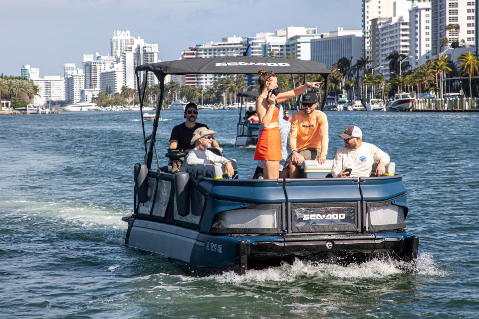 people on sea doo switch pontoon