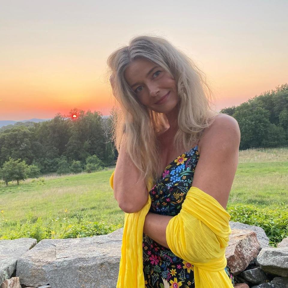 Paulina Porizkova in a dress with the sunset