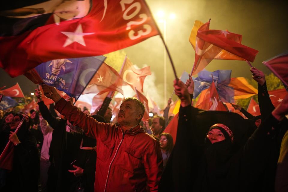 Supporters of Turkish President Recep Tayyip Erdogan celebrate in Istanbul, Turkey, Sunday, May 28, 2023. Turkey's incumbent President Recep Tayyip Erdogan has declared victory in his country's runoff election, extending his rule into a third decade. (AP Photo/Emrah Gurel)