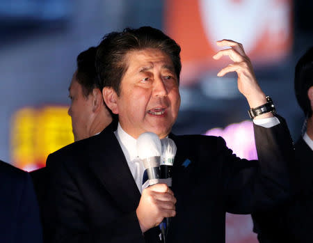 Japan's Prime Minister Shinzo Abe, who is also ruling Liberal Democratic Party leader,makes a speech at an election campaign rally in Tokyo, Japan October 18, 2017. REUTERS/Toru Hanai
