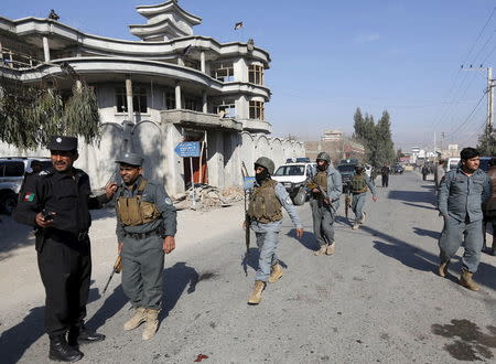 Afghan policemen arrive at the site of a suicide attack in Jalalabad, Afghanistan January 17, 2016. REUTERS/ Parwiz