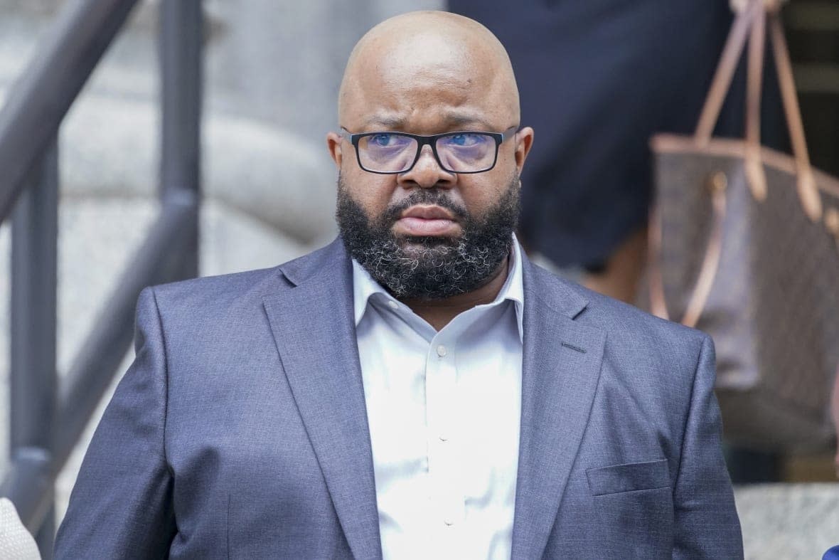 R. Kelly’s manager Donnell Russell leaves federal court, Wednesday, July 20, 2022, in New York. (AP Photo/Mary Altaffer, File)