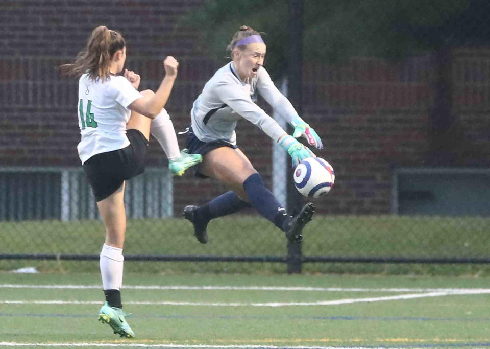 MND's Allie Lammers, a state-champion goalkeeper shown getting a stop against Seton in 2021, returns to the Cougars after missing time in 2022.