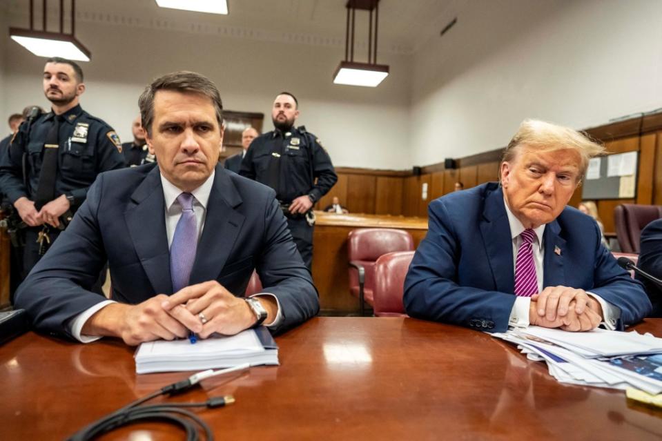 Lawyer Todd Blanche (right) with Donald Trump on at Manhattan Criminal Court via REUTERS