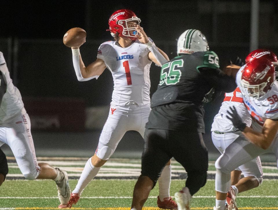 East Union's Dylan Lee throws as a McNair defense breaks through the offensive line at McNair in Stockton on Friday, Sept. 2, 2022.
CLIFFORD OTO/THE STOCKTON RECORD