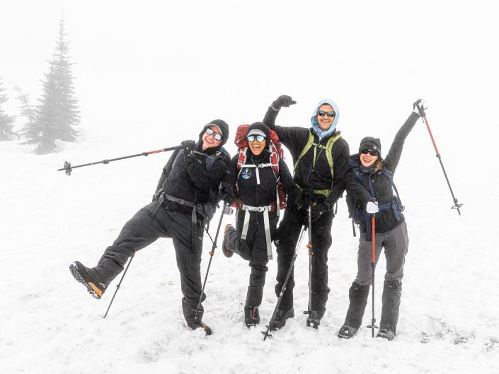 inspiration4 crew members celebrate while climbing mount rainier in snow ice