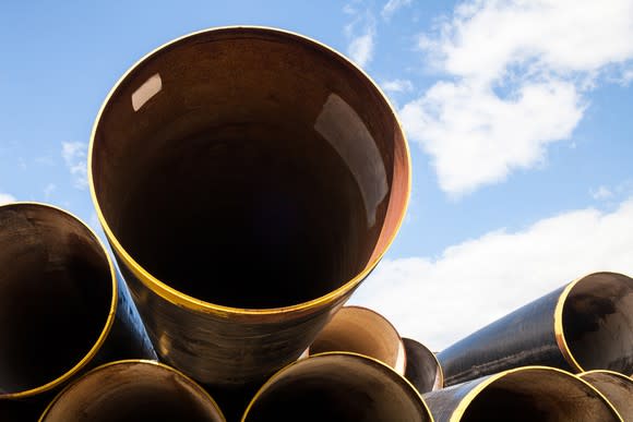 A stack of pipelines with a blue sky in the background