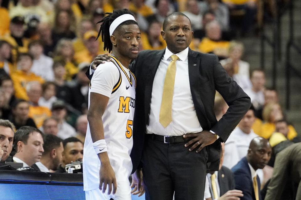 Missouri Tigers guard Sean East II (55) and head coach Dennis Gates look on during the second half against the Iowa State Cyclones at Mizzou Arena.