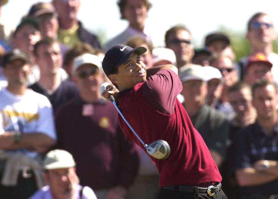 July 23, 2000 -- Tiger Woods drives during his round on the final day of the British Open on the Old Course at St. Andrews, Scotland.